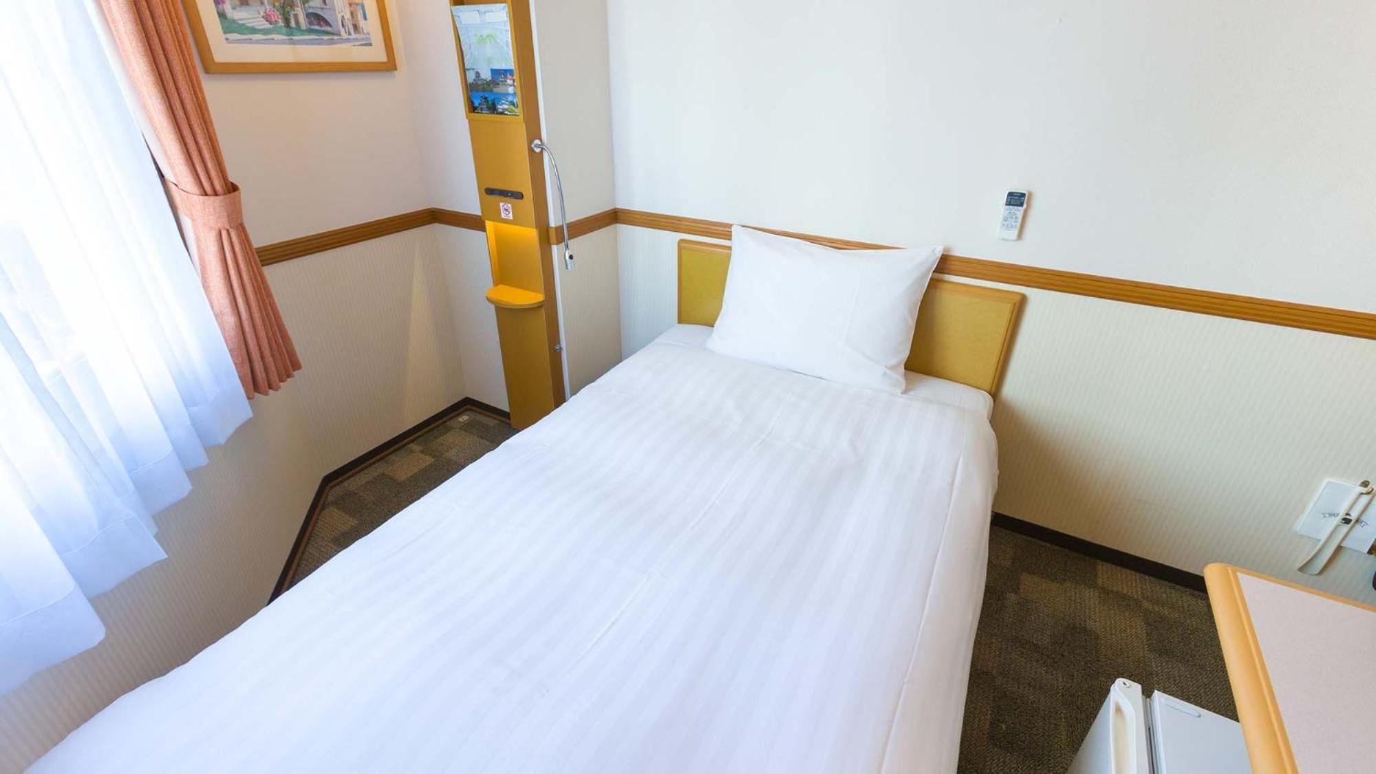 Toyoko Inn Okayama Eki Nishi Guchi Hiroba Rom bilde