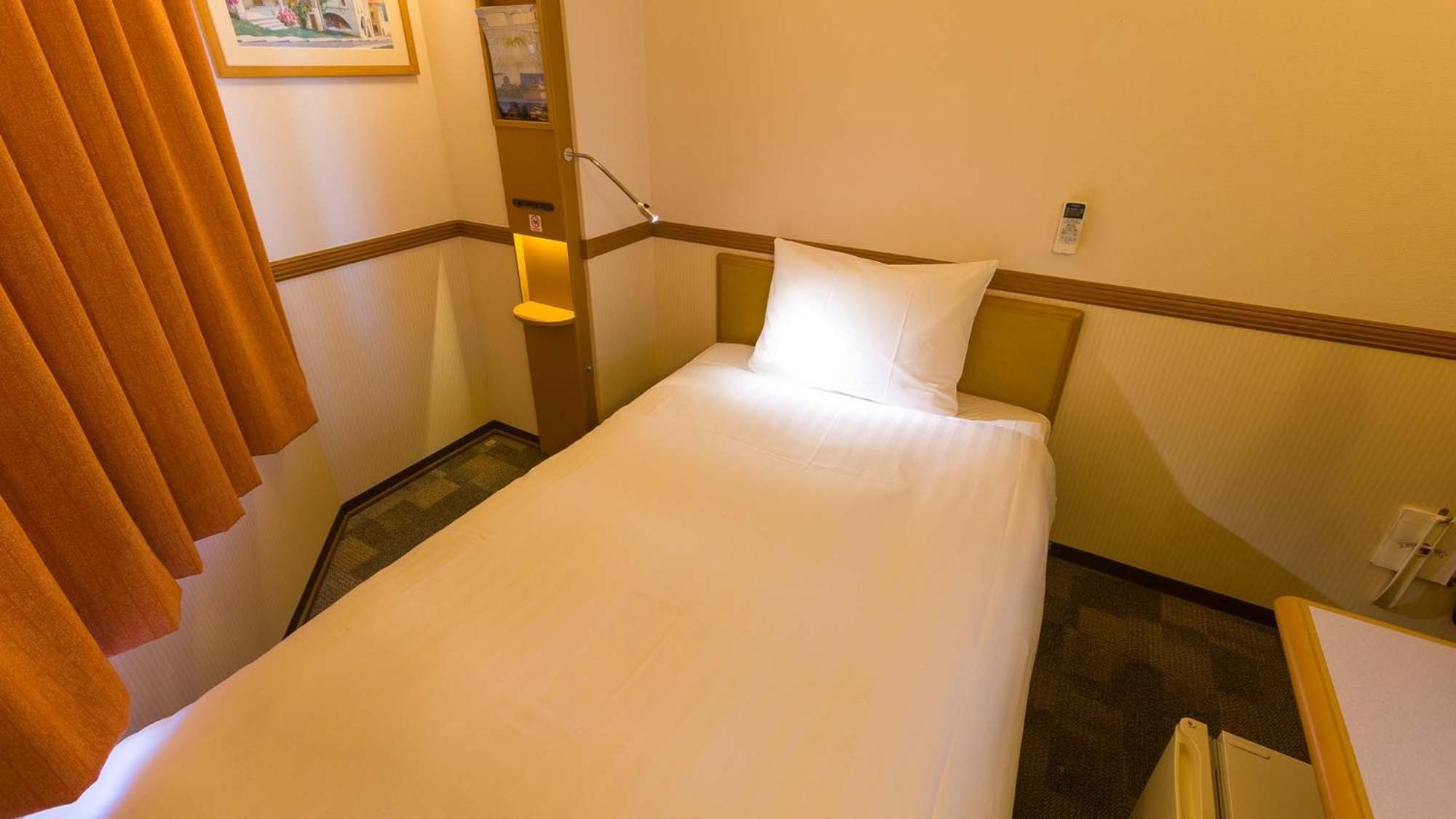 Toyoko Inn Okayama Eki Nishi Guchi Hiroba Rom bilde